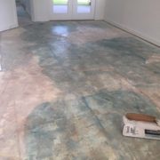 Concrete slab floor after tile removed