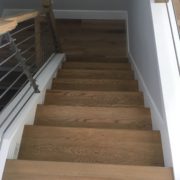 Stained and finished stair treads installed