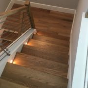 Stained and finished stair treads installed