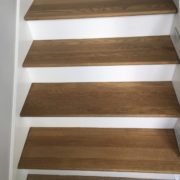 Stained and finished stair treads installed