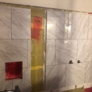 Installing porcelain wall tiles