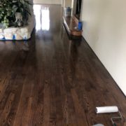 Applying Pallmann Power finish to Red Oak flooring.