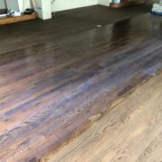 Applying sealer to Red Oak flooring