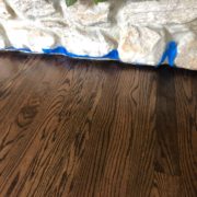 Finished Red Oak flooring - fireplace detail