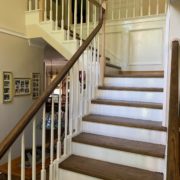 Stained, finished stair treads and rail