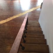 View from stairs- sanding Southern Yellow Pine plank flooring