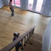 Popping the sanded wood flooring grain