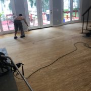 Popping the sanded wood flooring grain