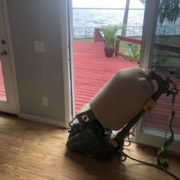 Sanded Southern Yellow Pine plank flooring - view of patio and river