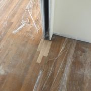 Weave in unfinished white oak flooring at doorway