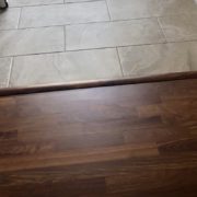 Caribbean rosewood flooring and Emser tiled foyer