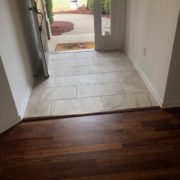 Caribbean rosewood flooring and Emser tiled foyer