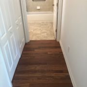 Emser porcelain floor tile and Caribbean rosewood flooring - installed