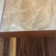 Caribbean rosewood transition to Emser porcelain floor tile