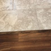 Caribbean rosewood transition to Emser porcelain floor tile