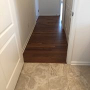Emser porcelain floor tile and Caribbean rosewood flooring