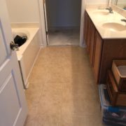 Emser porcelain floor tile installed in one of the bathrooms