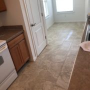 Emser porcelain floor tiled kitchen and dining room