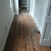 Heart pine plank flooring, prior to refinishing