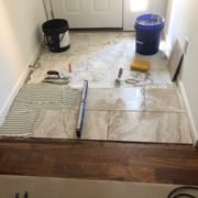 Installing Emser porcelain floor tile - foyer