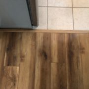 Luxury Vinyl Plank flooring transition to existing tile