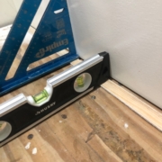 Leveling stair treads with shims.