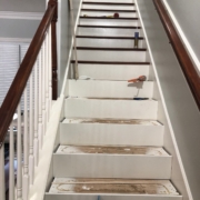 Progress installing Brazilian Cherry stair treads.