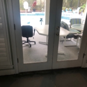 Leveled concrete slab subfloor - view of patio & pool