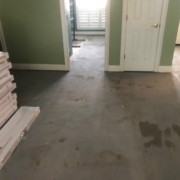 Leveled concrete slab subfloor