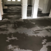 Leveling concrete slab floor