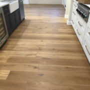 Installed 8 inch wide, French White Oak plank flooring