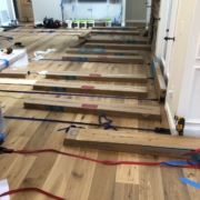 Installing 8 inch wide, French White Oak plank flooring