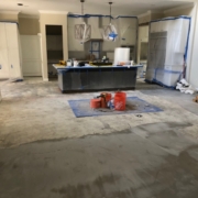 Leveled concrete slab subfloor, prior to wood flooring install