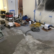 Leveled concrete slab subfloor, prior to wood flooring install