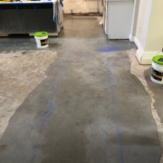 Leveled concrete slab subfloor, prior to wood flooring install