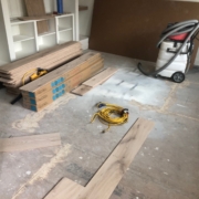 Leveled sheet plywood subfloor