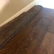 Installed birch hardwood flooring - top of the stairs