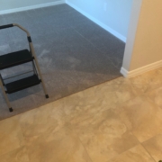 Tile and carpeting to be removed.