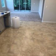 Tile and carpeting to be removed.