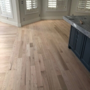 Sanded, hand scraped Red Oak floors.