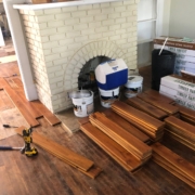 Installing solid Acacia wood flooring.
