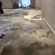 Leveling concrete slab subfloor.