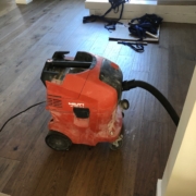 Removing bathroom flooring.