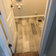 Transition to old bathroom flooring.