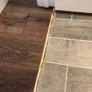 Transition to old bathroom flooring.