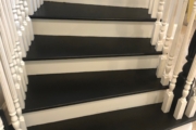 Finished, matte black painted stairway.