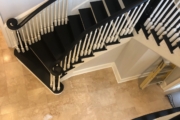 Finished, matte black painted stairway.