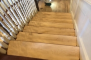 Sanding the staircase.