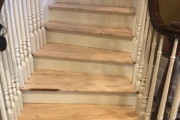 Sanding the staircase.