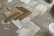 Installing French Oak flooring in the herringbone pattern.
